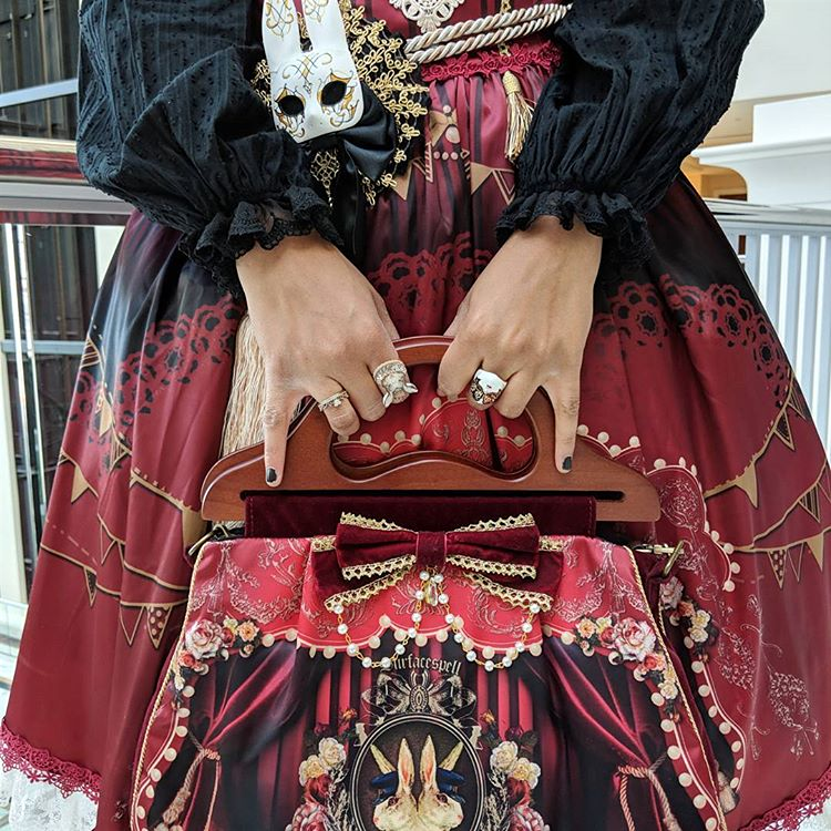 Detailing of bag and dress